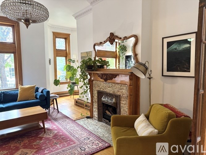 A kitchen with dark wood cabinets and a white countertop.