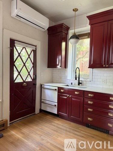 A house with a patio and a table set up for dining.