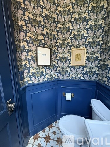 A garage with the number 1330 on it is located on a street.