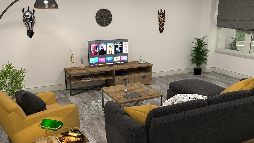 A living room with a television, two couches, and a coffee table.