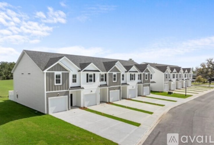 A row of houses with the word "available" on the bottom right.