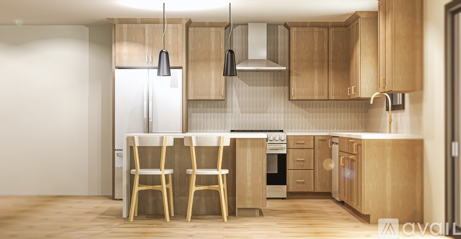 A modern kitchen with wooden chairs and cabinets.