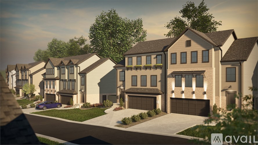 A row of houses with a car parked in front of the first one.