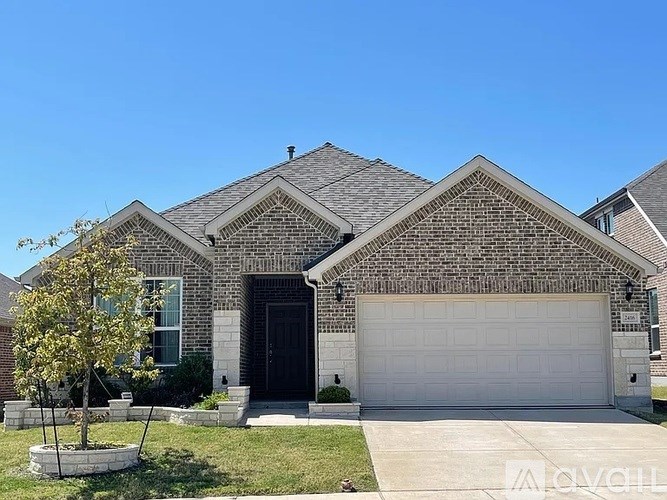 A house with a brick facade and a white garage door.