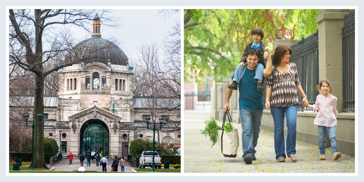 a man and woman walking down the street with a child