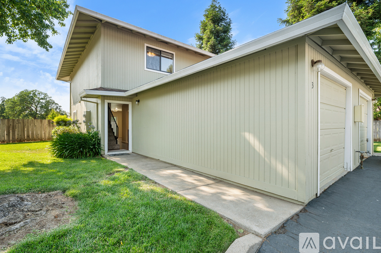 A house with a garage is available for rent.