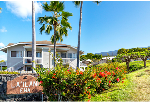 A house with a sign that says La Ilana Eha.