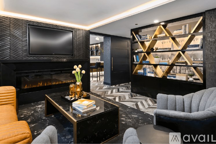 A modern living room with a fireplace and a television.