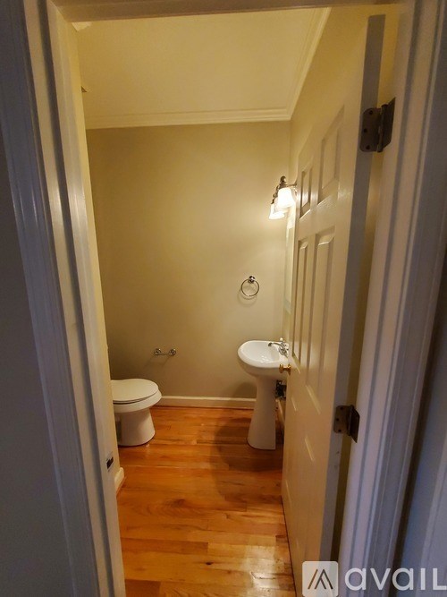 A small bathroom with a toilet and sink.