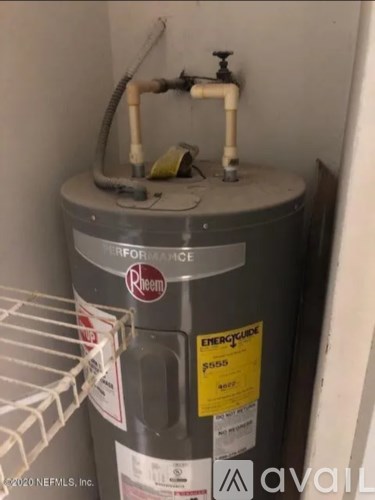 A Rheem water heater with a tag that reads $600.