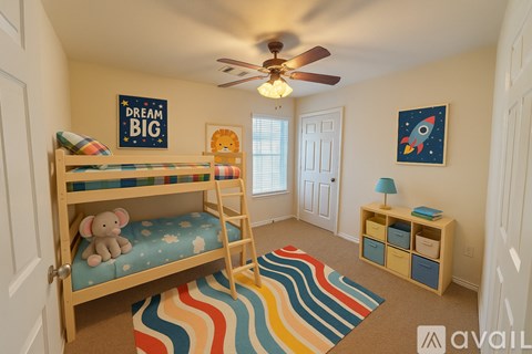 A child's bedroom with a bunk bed and a colorful rug.