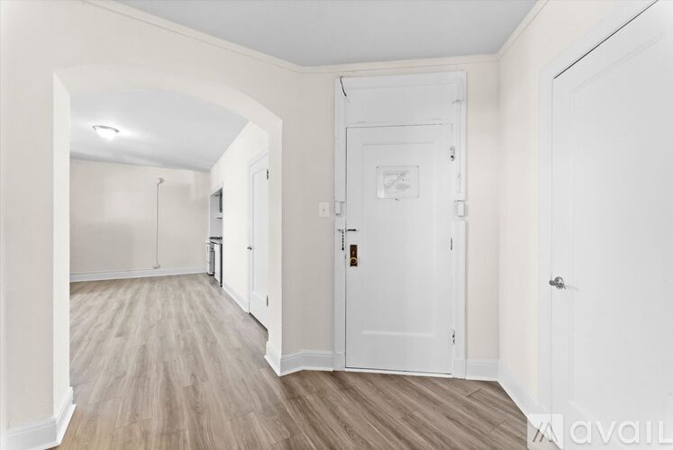 A floor plan of an apartment at 3335 West Diversey Avenue, Unit 01, showing a living room, kitchen, and bedroom.