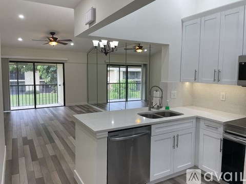 A kitchen with a dishwasher and a sink.