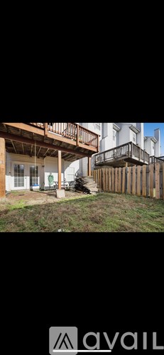 A balcony with a railing and a door is visible.
