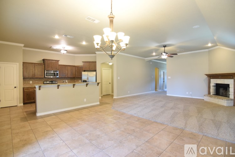 A house with a garage and a driveway.
