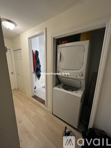 A washer and dryer in a small room.