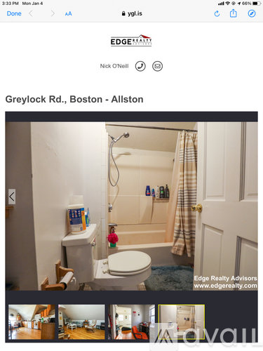 A bathroom with a toilet, sink, and shower.