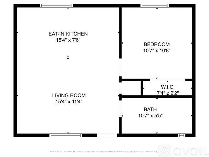 A floor plan for a home with an eat-in kitchen, living room, bedroom, and bath.