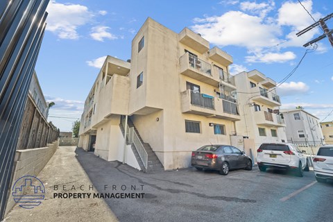 A building with the words "BEACH FRONT PROPERTY MANAGEMENT" on the bottom left corner.
