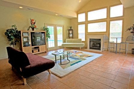 a living room with a couch and a tv