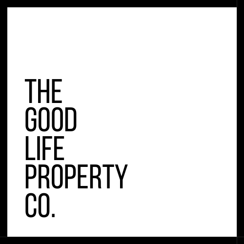 A sign that says "The Good Life Property Co.".