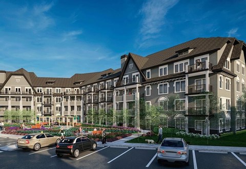 A rendering of a large, multi-story residential building with a parking lot in front.