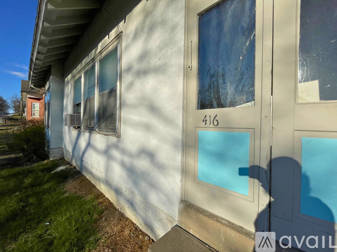 A house numbered 416 is for sale.