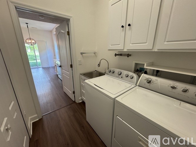 A laundry room with a washer and dryer.