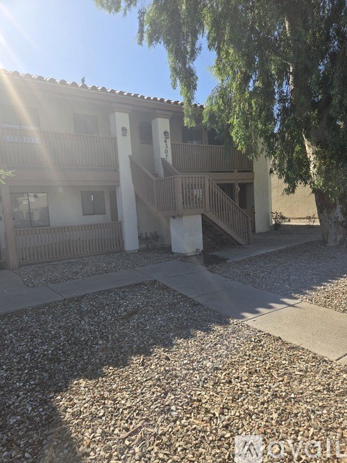 A sunny day at the outdoor patio of a residential building.