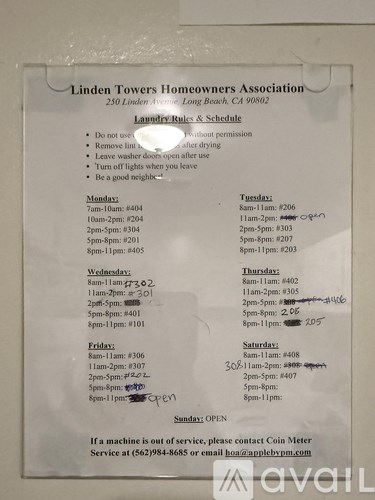 A flyer for the Linden Towers Homeowners Association is pinned to a wall.