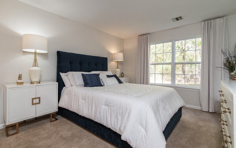 the estates green apartments bedroom
