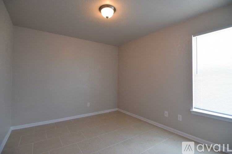 A bathroom with a sink and mirror.