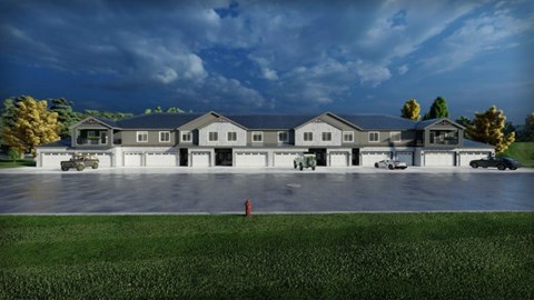 A large building with a parking lot in front of it.