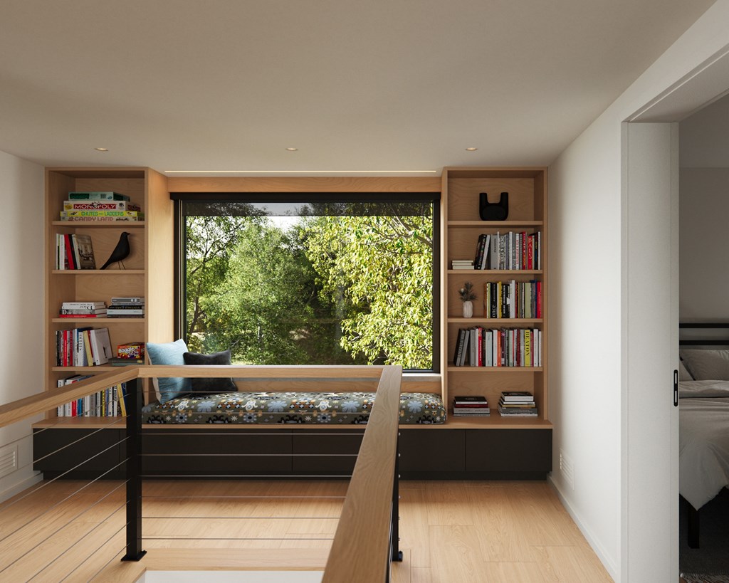 A room with a bed and a bookshelf filled with books.