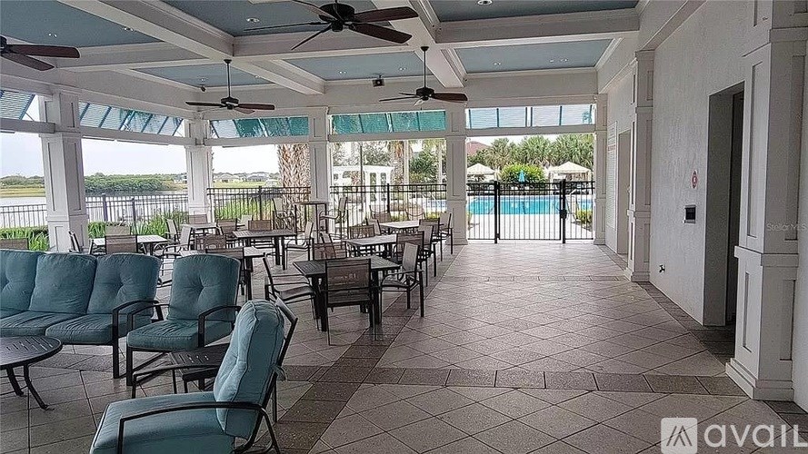 A patio with chairs and a table is available for rent.