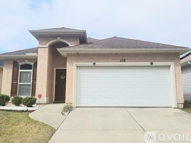 A house with the number 108 on the front.