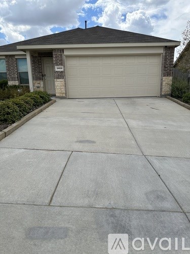 A house with a garage door that says "Available".