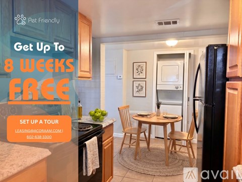 A kitchen with a stove and an offer for a free first month.