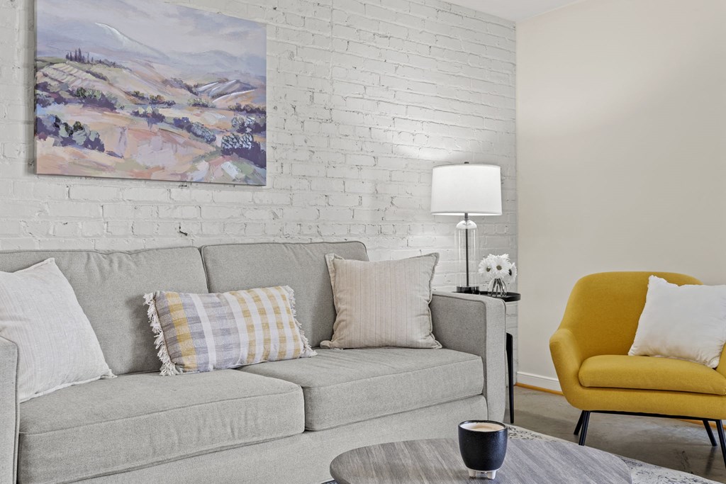 a living room with a couch and a coffee table