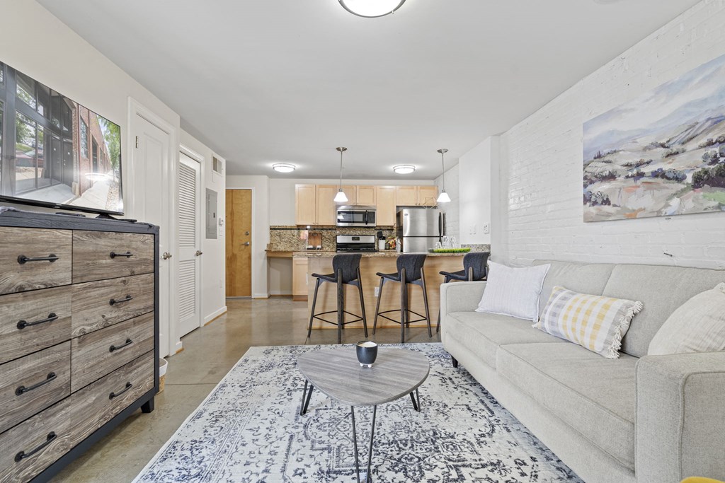 a living room with a couch and a table