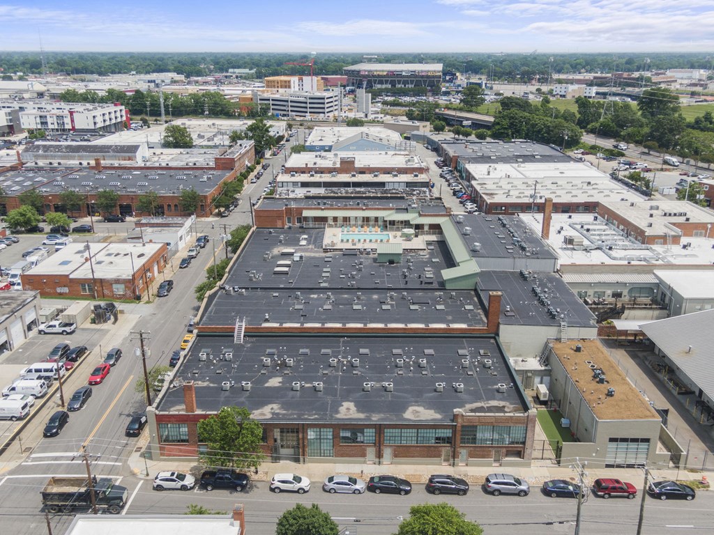 an aerial view of a parking lot in a city