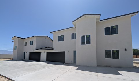 A modern house with a large garage.