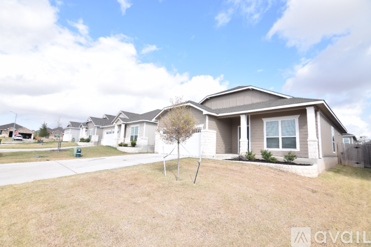 A house with a lawn in front of it is for sale.