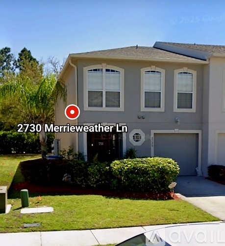 A house with the number 2730 and the name Merrieweather Ln on it.