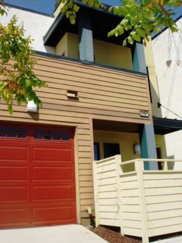 A house with a red garage door.