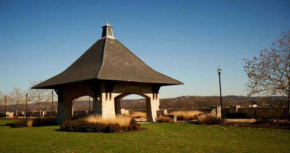 a gazebo with a steeple in a park