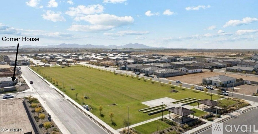 A corner house is shown in the image.