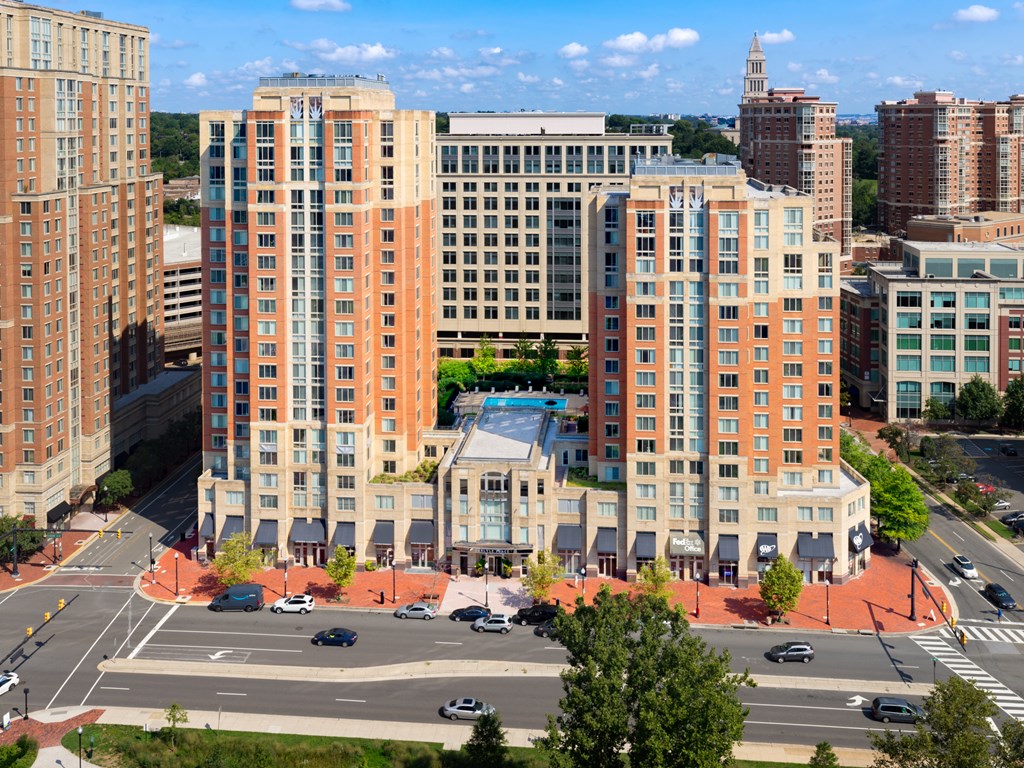 A city street with cars and buildings.