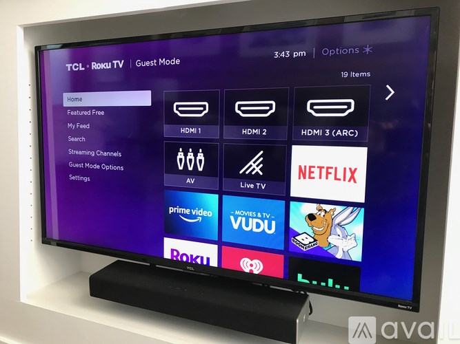 A TCL Roku TV screen displays the Guest Mode menu with options for Netflix, Prime Video, and other streaming services.