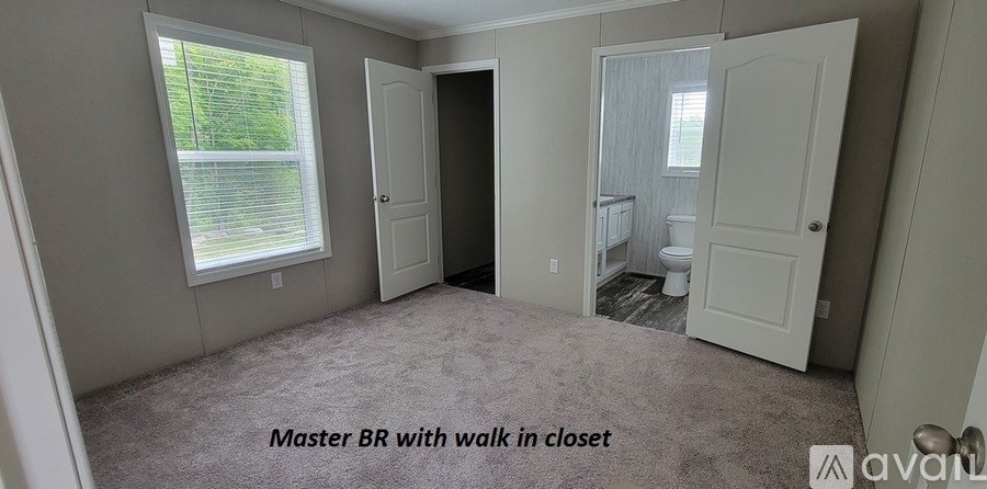 A room with Master Bedroom with walk in closet.